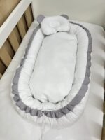 Ninho redutor de berço branco e cinza. - Imagem 2