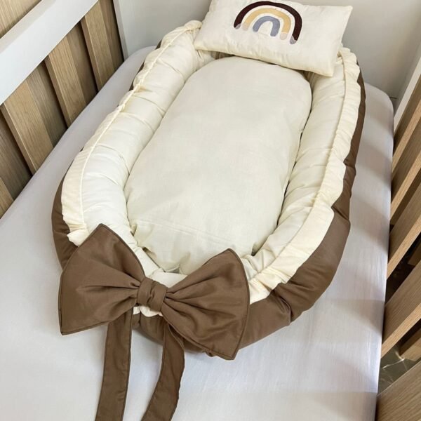 Ninho redutor de berço.