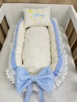 Ninho redutor de berço.